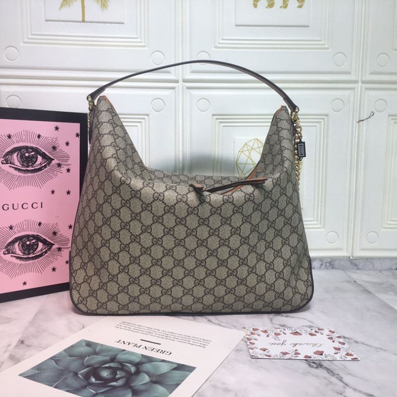G*u*i top handle bags